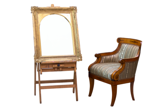 Vintage wooden easel with ornate golden frame and classic upholstered armchair furniture set