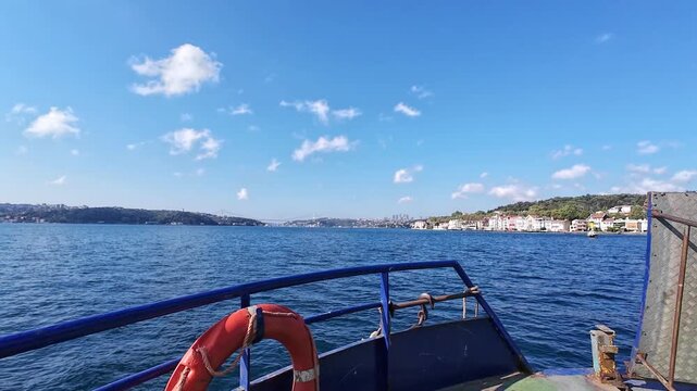 Beykoz Yenik&ouml;y ferry on the Bosphorus. Sea view from a sailing boat. Maritime transportation idea concept. 4k horizontal video. 