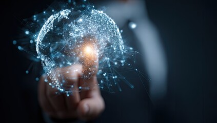 Hand touching a digital representation of Earth