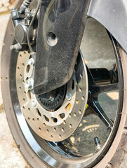 Close-up of Motorcycle Front Wheel Brake System.