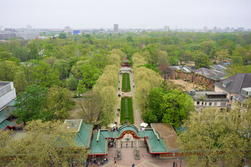 Drone aerial panoramic view of Berlin Zoo entrance with central alley, fountain and surrounding...