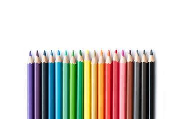 Obraz premium Colourful wooden colored pencils isolated on white