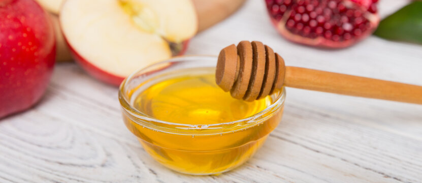 Flat lay composition with symbols jewish Rosh Hashanah holiday attributes on colored background, Rosh hashanah concept. New Year holiday Traditional. Top view with copy space