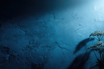 Mysterious blue wall, shadowy plant