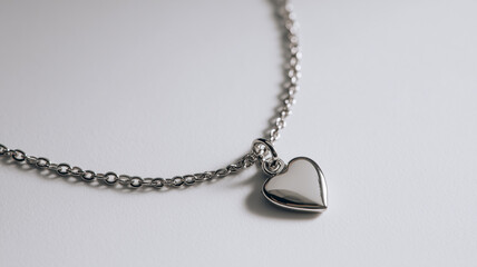 Silver heart pendant on chain