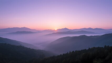 Fototapeta premium Sunrise Over Misty Mountain Valleys