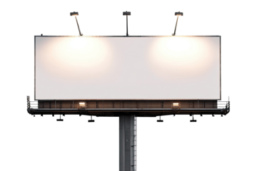 Blank billboard, mounted on a dark metal pole, with two light fixtures above the white surface
