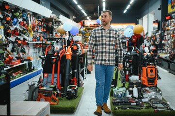 Portrait of mature man standing in hardware store