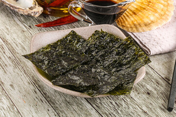 Green nori seaweed chips with soya sauce