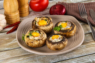 Baked champignon with quail egg