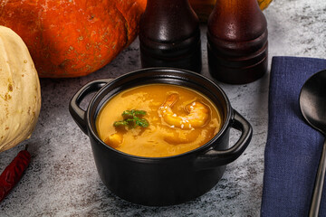 Pumpkin cream soup with prawns