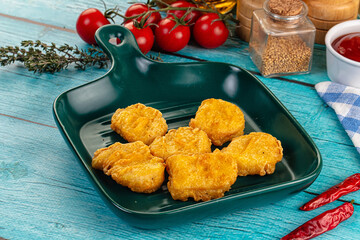 Golden crispy fried chicken nuggets