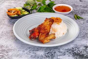 Spicy roasted chicken wing with rice