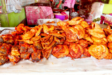 Crispy Fried Fish Assortment at a Market