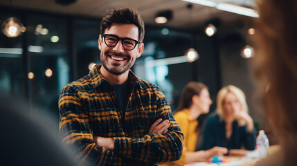 Fototapeta premium Confident professional smiling with arms crossed during a meeting. Teamwork, collaboration, and modern office vibes. Casual style and workplace joy.