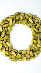 Circle of green cardamom pods