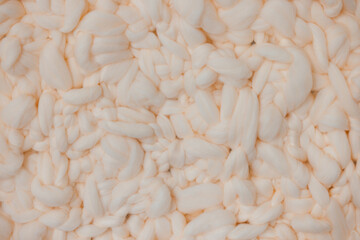 Cozy knitted wool texture with large warm stitches as background