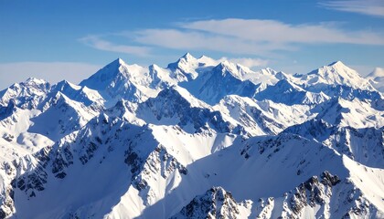 Obraz premium Snowy mountain peaks under a vibrant blue sky (2)