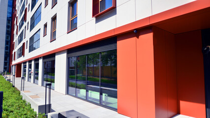 Panoramic windows of new commercial premises. Commercial property in development standard for rent.