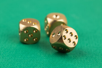 Random number generator. Three dice with numerical values lie in a chaotic order