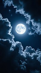 Fototapeta premium Full Moon Shining Through Dramatic Clouds night sky