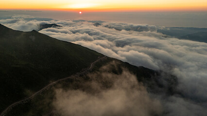 Golden sunset illuminating clouds over the Kocduzu Highland, Rize, Turkiye