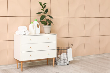 Interior of room with commode and laundry basket