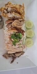 Savory chicken rice dish southeast asia food photography culinary delight close-up view gastronomic...