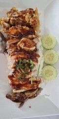 Delicious chicken rice dish street food market food photography urban setting close-up view...
