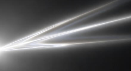 Abstract glowing light streaks on dark background