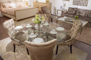 Luxurious living room with a round glass table