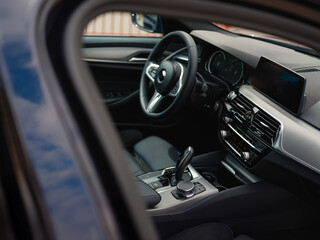 Naklejka premium Luxury Modern Car Interior with Leather Seats, Dashboard and Advanced Technology.