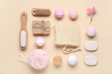 Composition with different spa accessories and bath bombs on color background