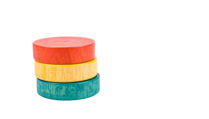 Stack of colorful, circular, wooden discs isolated on solid white background in Png 