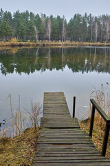 Wooden Pier on a Calm Autumn Lake