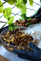 Wooden spoon with date and nut mixture for natural energy snacks