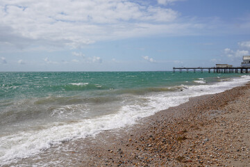 sea view and horizon at the seaside on sunny day. pebble beach in summer 