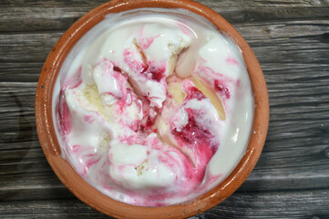 Vanilla strawberry ice cream, vanilla Ice-Cream with strawberry sauce, Ice cream is a frozen...