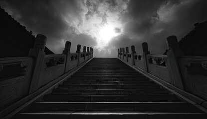 Obraz premium Black and white stone steps ascend toward a bright sky