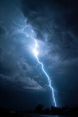 Dramatic lightning strike in dark storm clouds