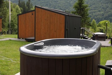 Tub with hot water at luxury resort in mountains
