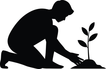 Person kneeling planting a small sapling in the ground silhouette