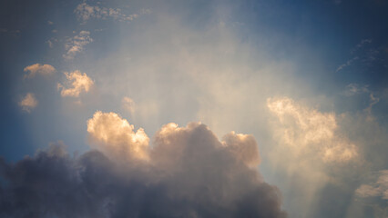A landscape like an oil painting created by clouds and sunlight