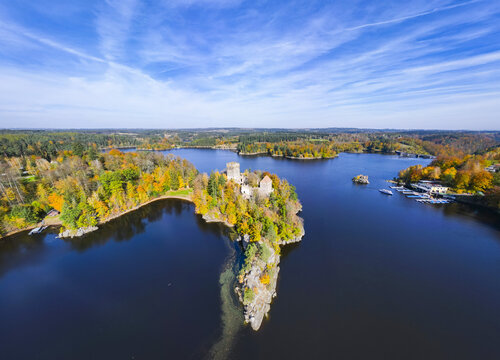 Aerial view of the medieval ruin on an island surrounded by the dark blue water, a testament to history against the serene autumn landscape, Ottenstein, Nieder&Atilde;&para;sterreich, Austria.