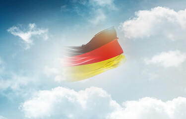 Germany national flag waving and fading on white background. The flag uses for banner and poster...