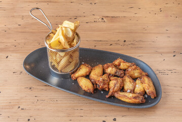 Crispy, classic-style fried chicken wings, golden brown and seasoned with a secret blend of spices.