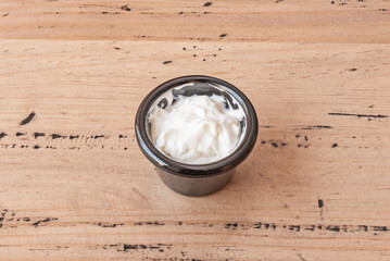 goblets with cilantro and lime mayonnaise, decorated with a fresh lime wedge on the rim
