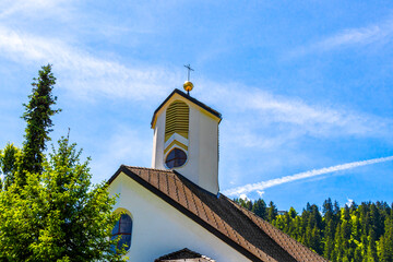 Travel in Austria sights villages forests mountains culture city life.