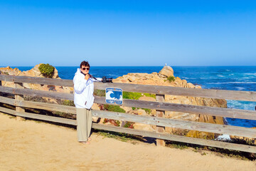 Woman in white jacket