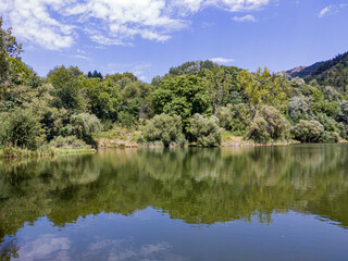 Fototapeta premium VIew to lake, trees and hills